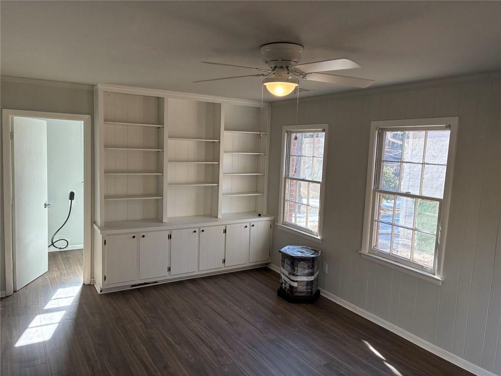 3992 Maplewood Drive Decatur, GA 30035 - Photo 26 of 44 an empty room with wooden floor and windows