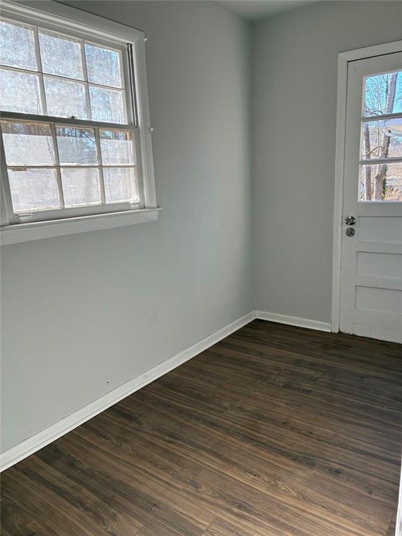 3992 Maplewood Drive Decatur, GA 30035 - Photo 29 of 44 a view of an empty room with wooden floor and a window