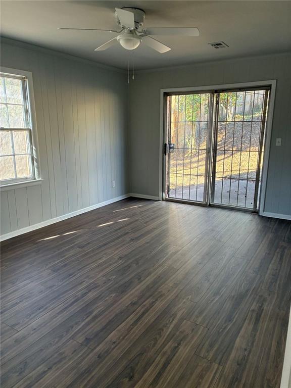 3992 Maplewood Drive Decatur, GA 30035 - Photo 30 of 44 an empty room with wooden floor and balcony