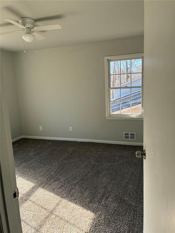3992 Maplewood Drive Decatur, GA 30035 - Photo 35 of 44 an empty room with a window