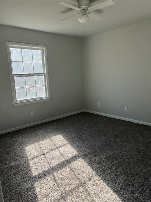 3992 Maplewood Drive Decatur, GA 30035 - Photo 39 of 44 an empty room with a empty space and windows