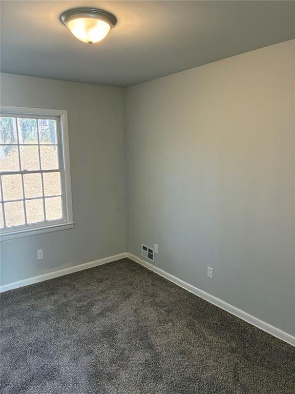 3992 Maplewood Drive Decatur, GA 30035 - Photo 40 of 44 an empty room with a window