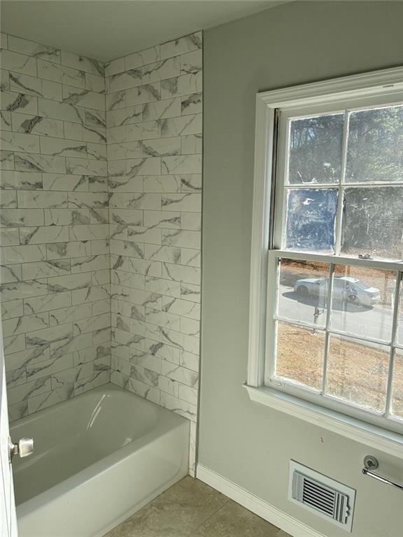 3992 Maplewood Drive Decatur, GA 30035 - Photo 42 of 44 a bathroom with a bathtub