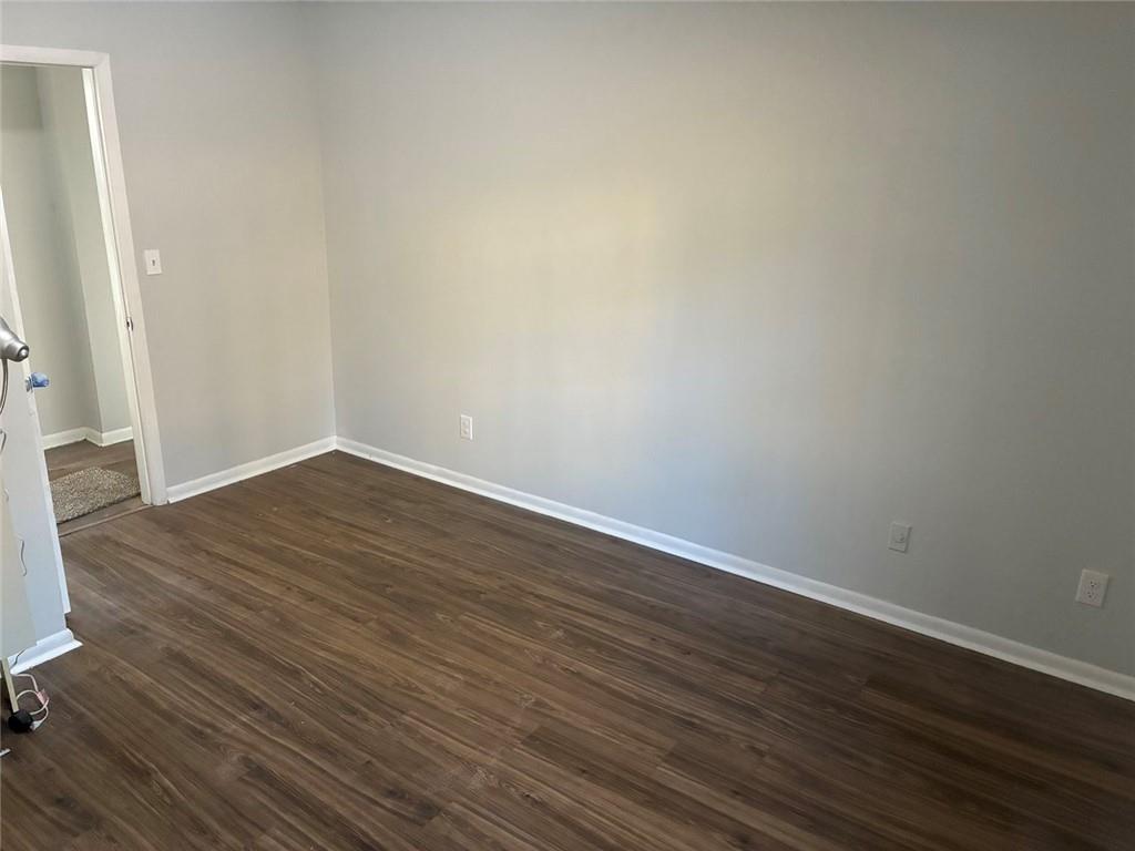 3992 Maplewood Drive Decatur, GA 30035 - Photo 8 of 44 a view of an empty room with wooden floor