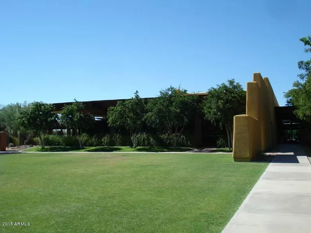 a outdoor living space with furniture potted plant