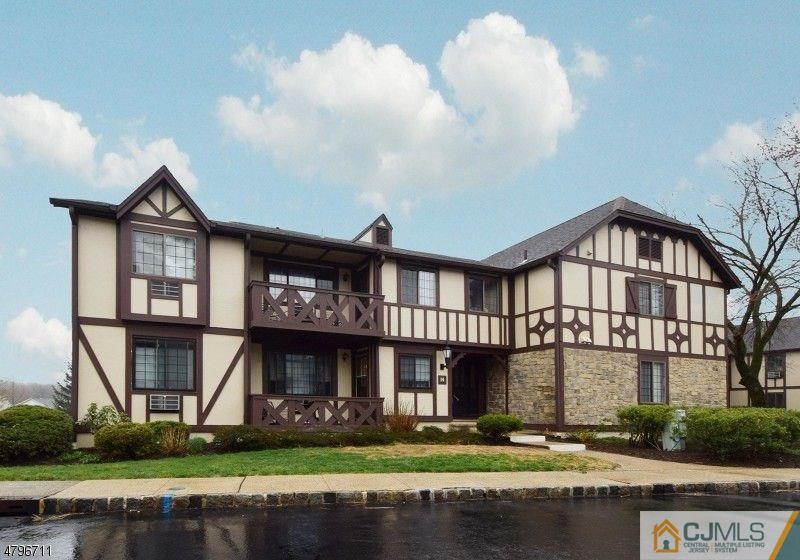 14 Kensington Road, Unit G Chatham, NJ 07928 - Photo 10 of 10 a front view of a building with garden