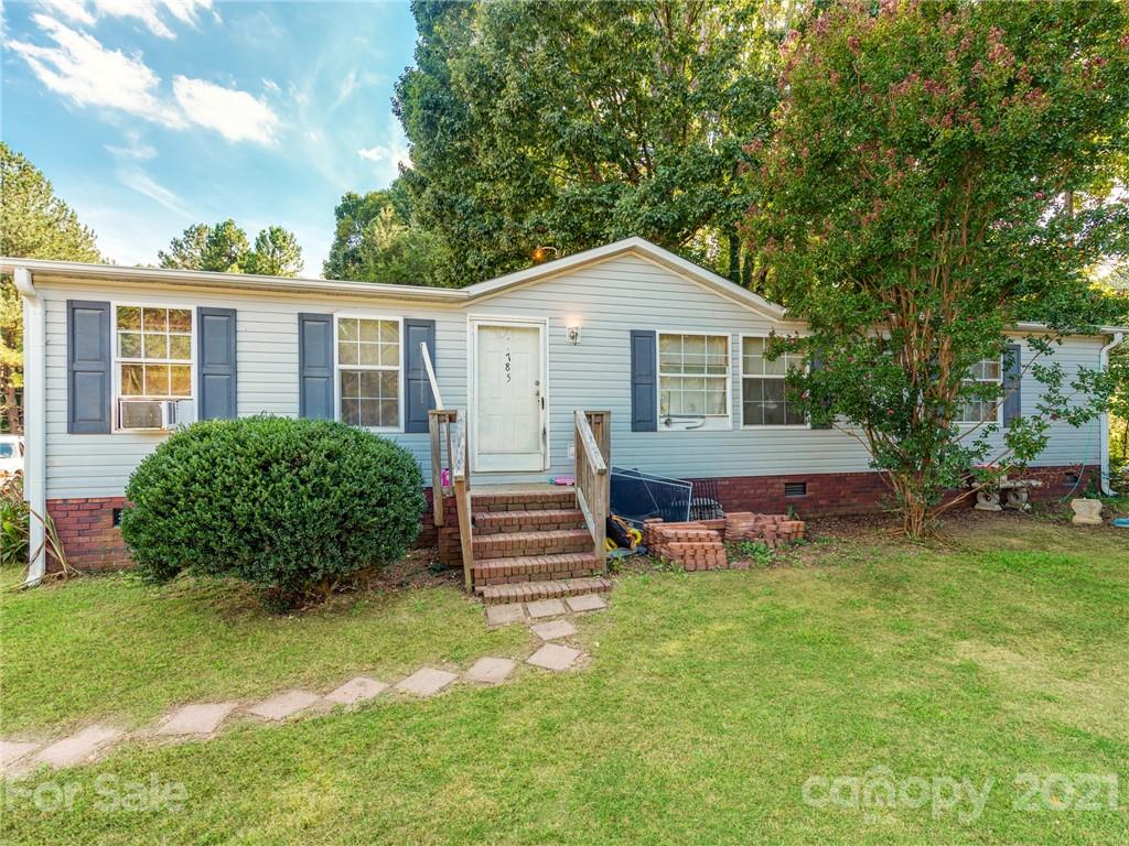 785 Thompson Road Salisbury, NC 28147 - Photo 2 of 23 a front view of a house with a garden
