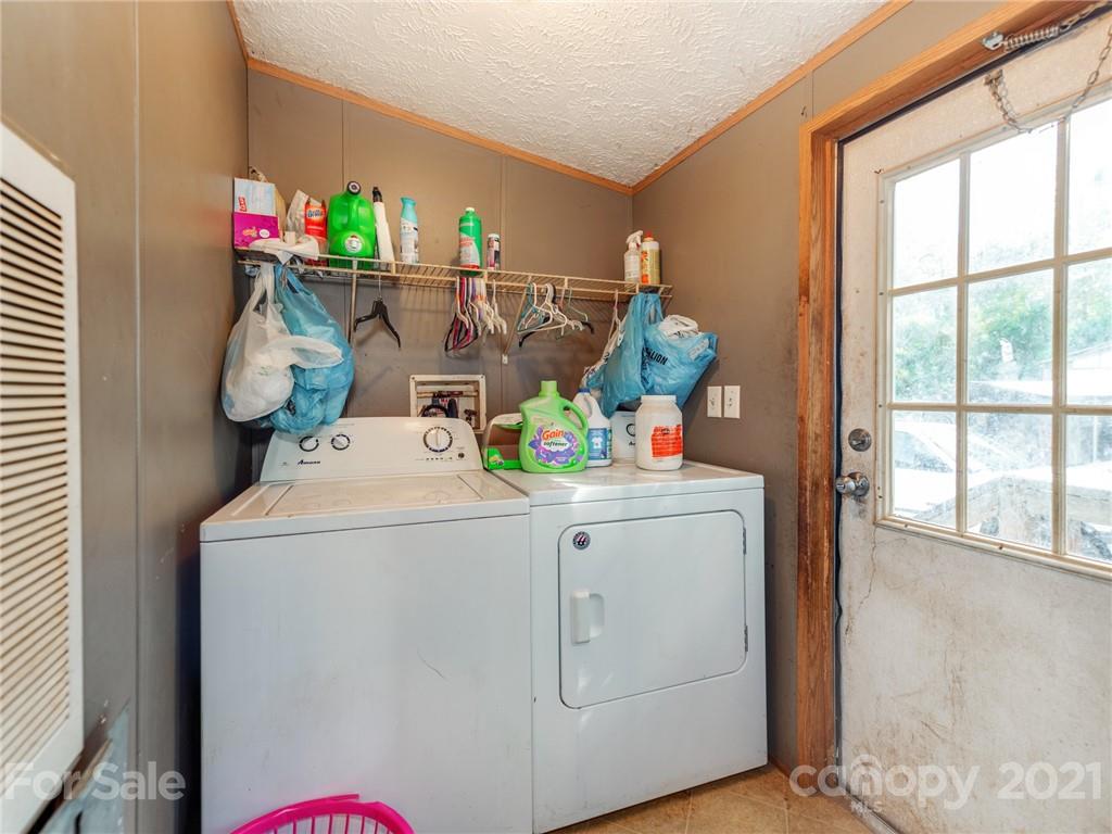 785 Thompson Road Salisbury, NC 28147 - Photo 16 of 23 a utility room with dryer and washer