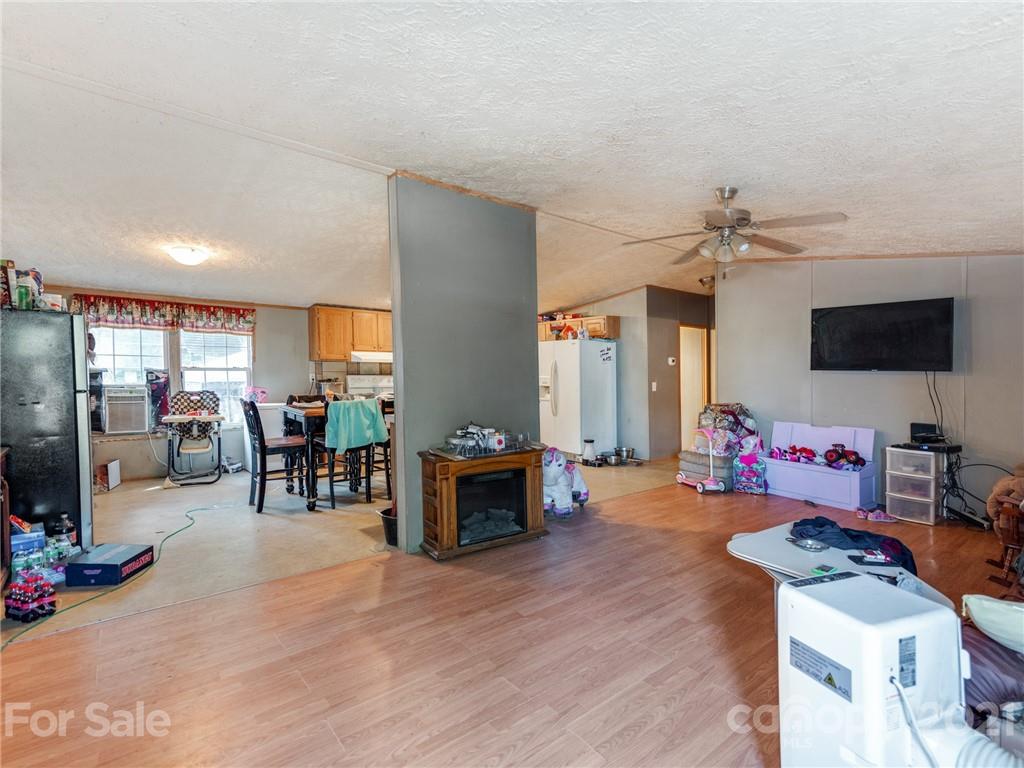 785 Thompson Road Salisbury, NC 28147 - Photo 3 of 23 a living room with furniture and a flat screen tv