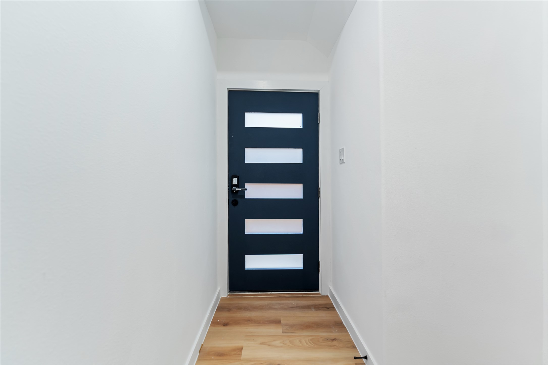 9326 Firnat Street Houston, TX 77016 - Photo 4 of 30 a view of bedroom with a door