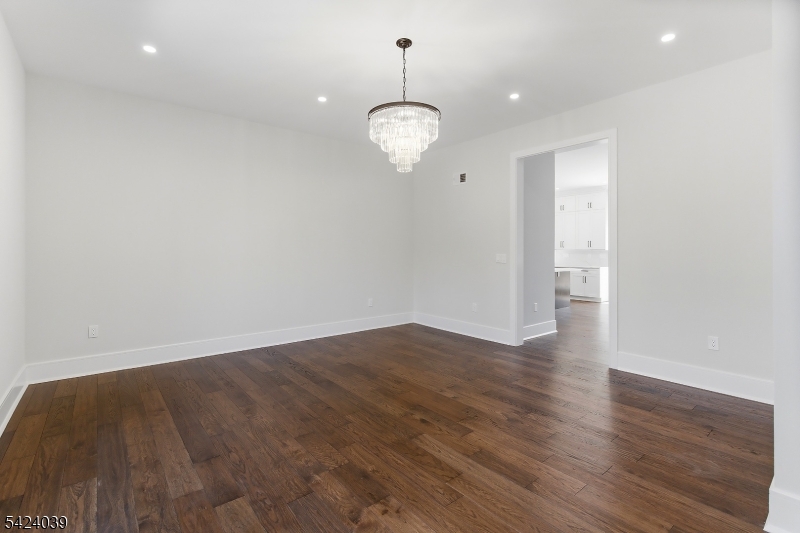 45 Kildee Road Belle Mead, NJ 08502 - Photo 34 of 43 a view of an empty room with wooden floor and windows