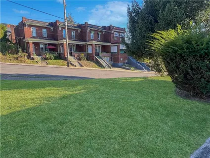 a view of a house with a swimming pool