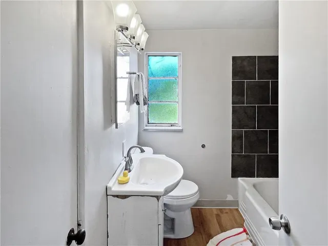 a bathroom with a sink and a toilet
