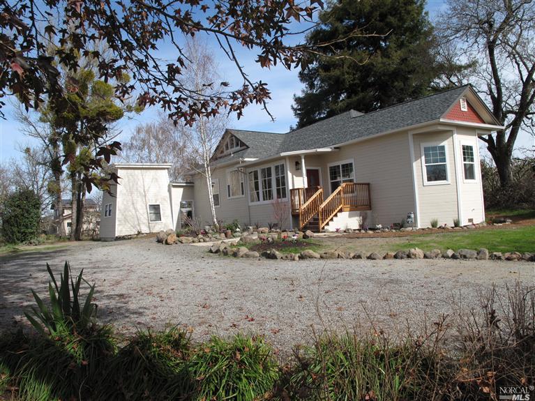 8775 Cider Springs Road Sebastopol, CA 95472 - Photo 1 of 1 a front view of a house with garden