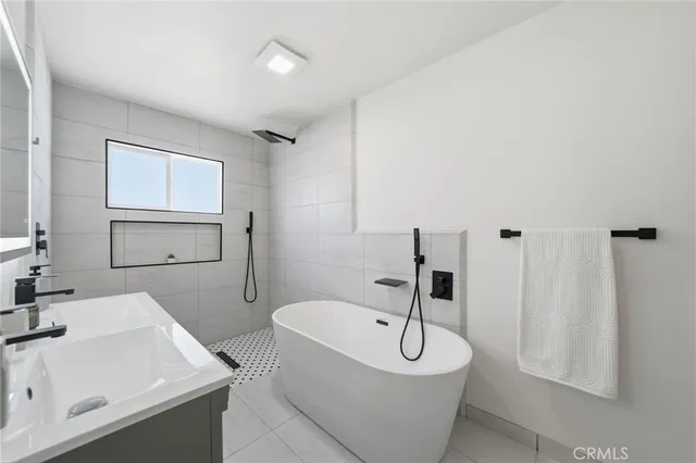 a bathroom with a sink and a bathtub