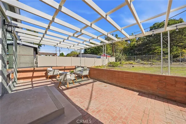 a front view of a house with a yard and a garage