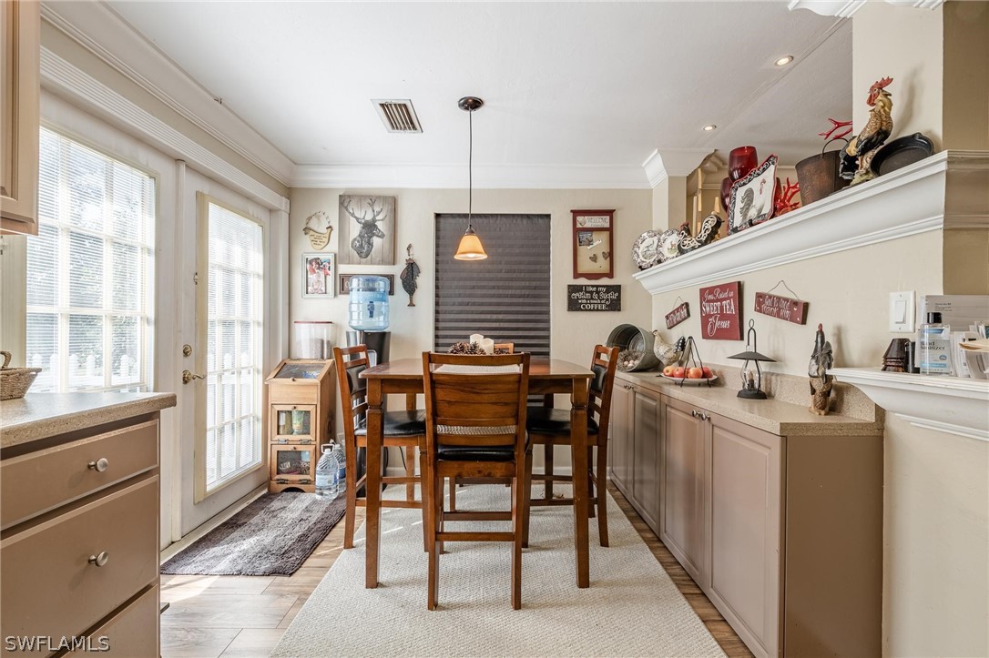2313 Hamilton Avenue Alva, FL 33920 - Photo 15 of 30 a dining room with furniture and window