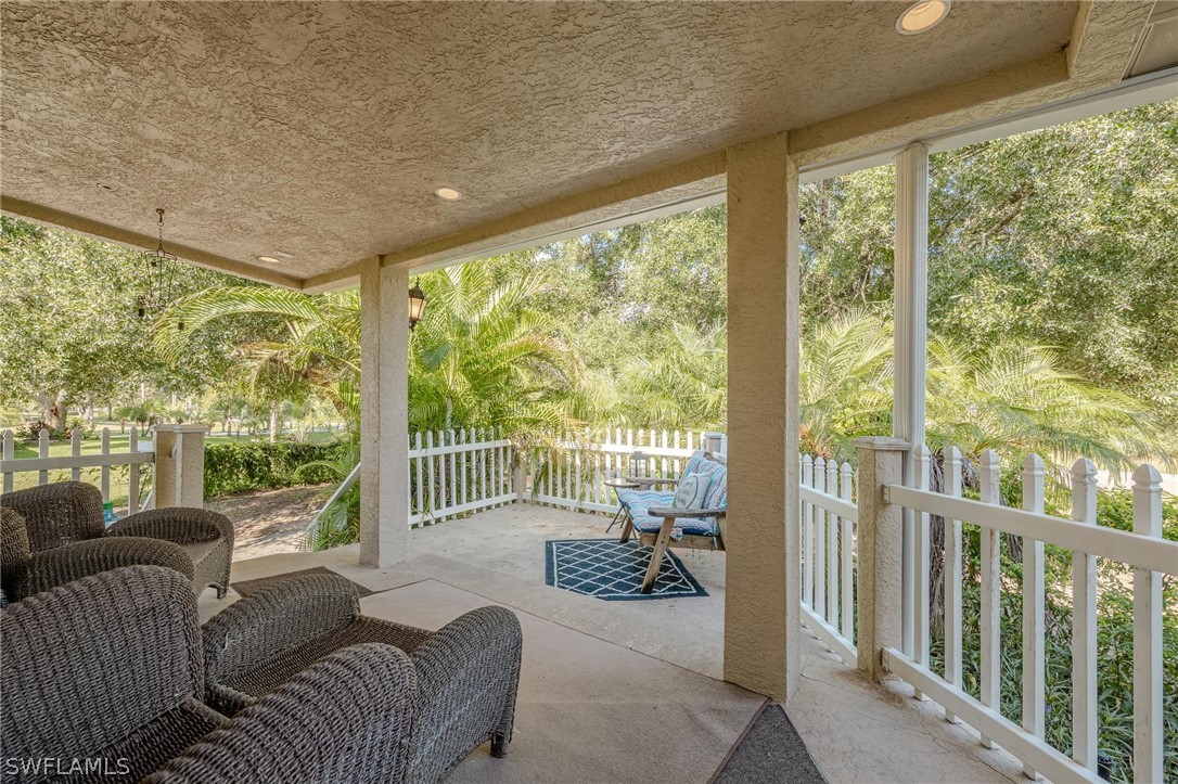 2313 Hamilton Avenue Alva, FL 33920 - Photo 3 of 30 a balcony with furniture and large windows