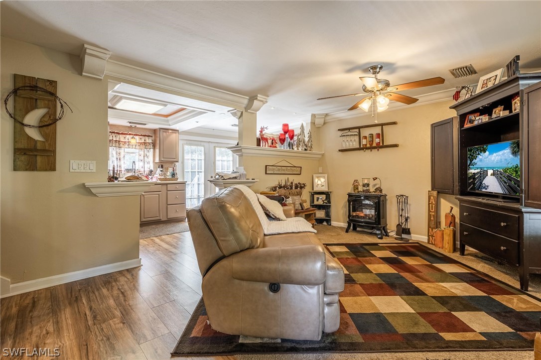 2313 Hamilton Avenue Alva, FL 33920 - Photo 6 of 30 a living room with furniture and a flat screen tv