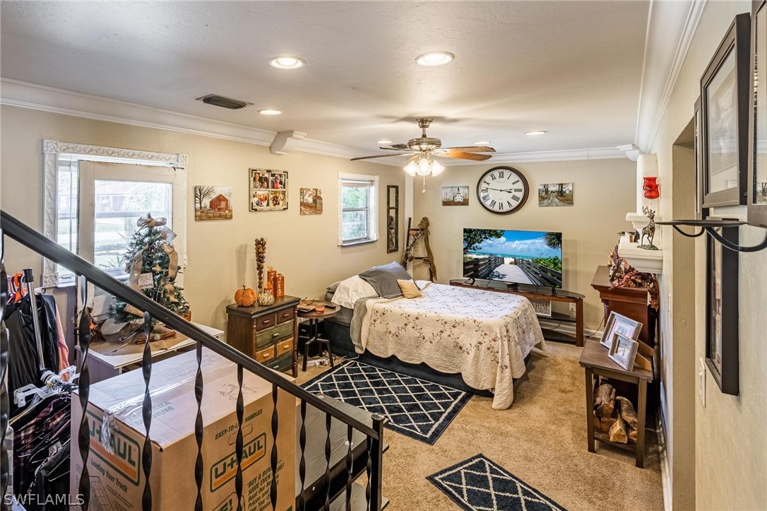 2313 Hamilton Avenue Alva, FL 33920 - Photo 10 of 30 a bedroom with bed and furniture