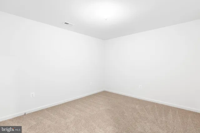 an empty room with an entryway