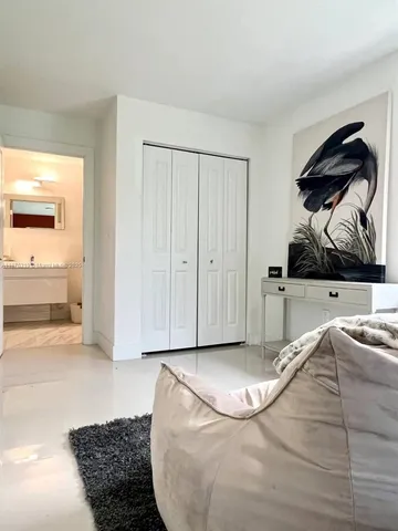 a white bath tub sitting in a bathroom
