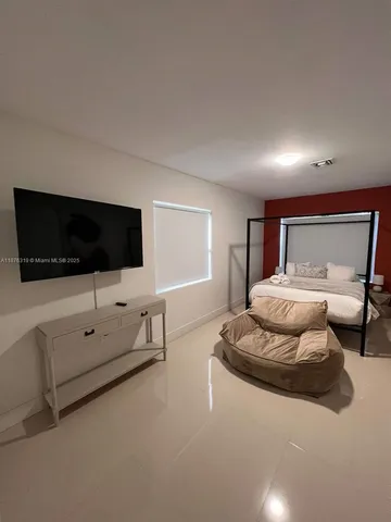 a view of a lake with a bench and lake view