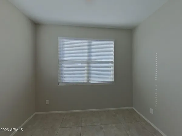 a kitchen with stainless steel appliances a refrigerator and microwave