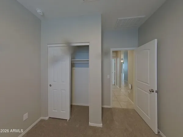 a bathroom with a sink double vanity and a mirror