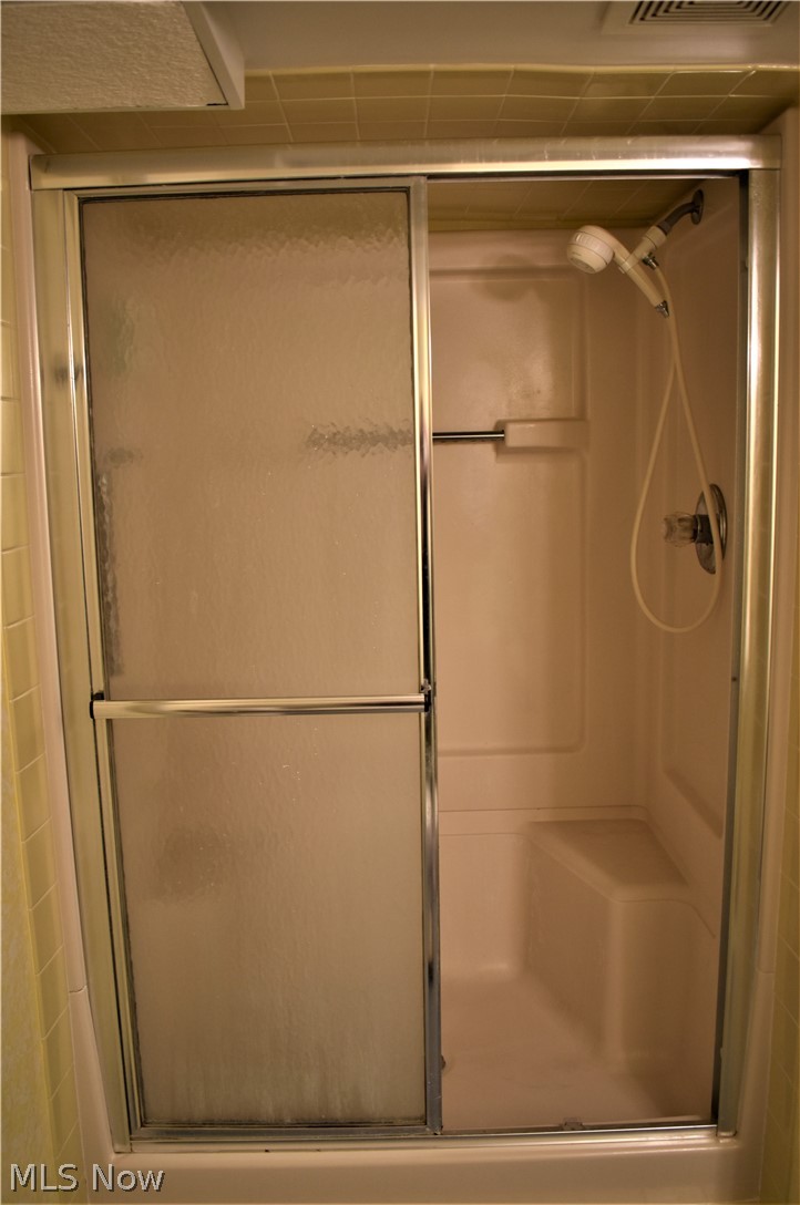 1245 Dayton Street Akron, OH 44310 - Photo 17 of 17 View #2 of shower in half bath in basement. (This bathroom does not have a sink.)
