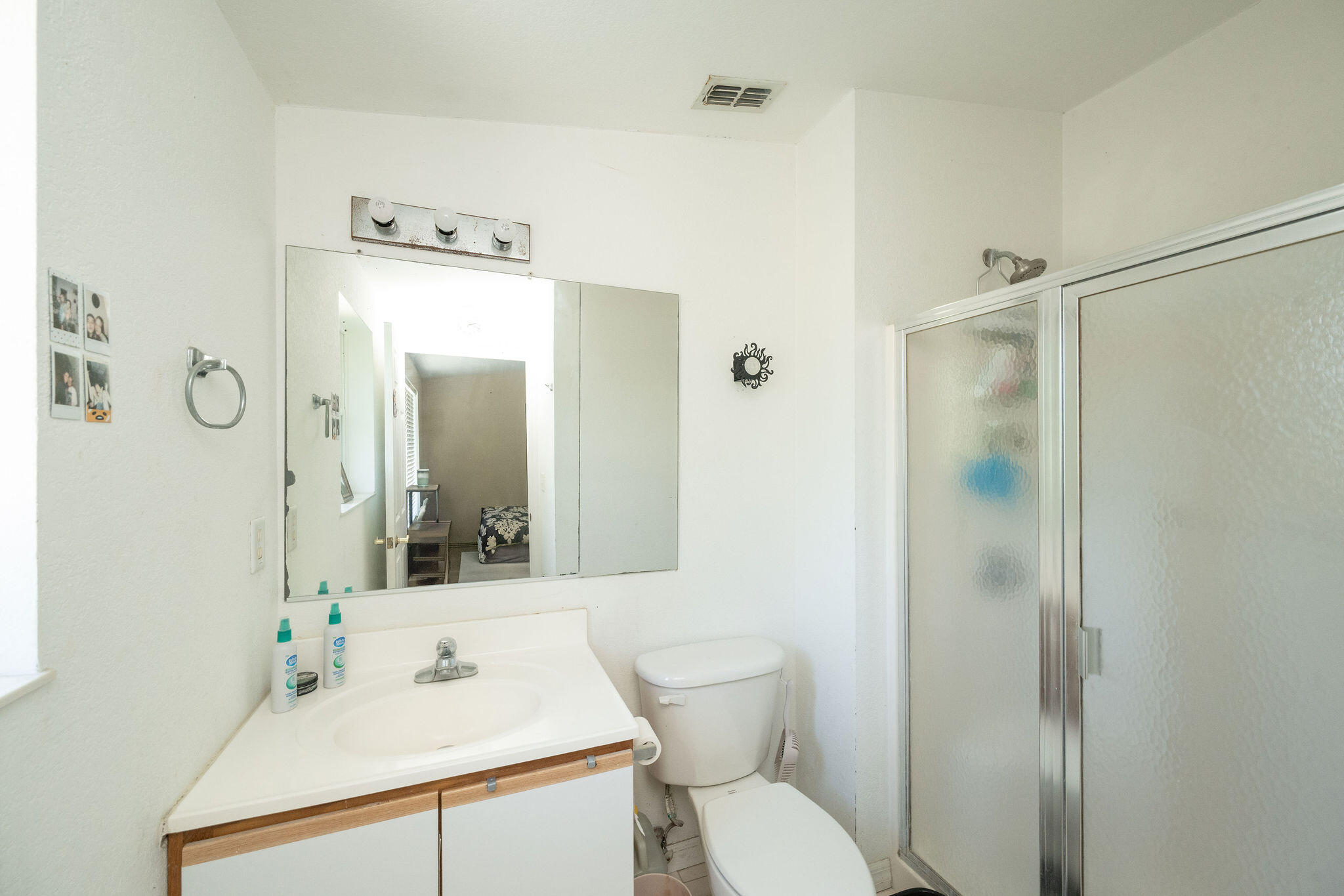 206 4th Street Key West, FL 33040 - Photo 12 of 44 a bathroom with a sink toilet and shower