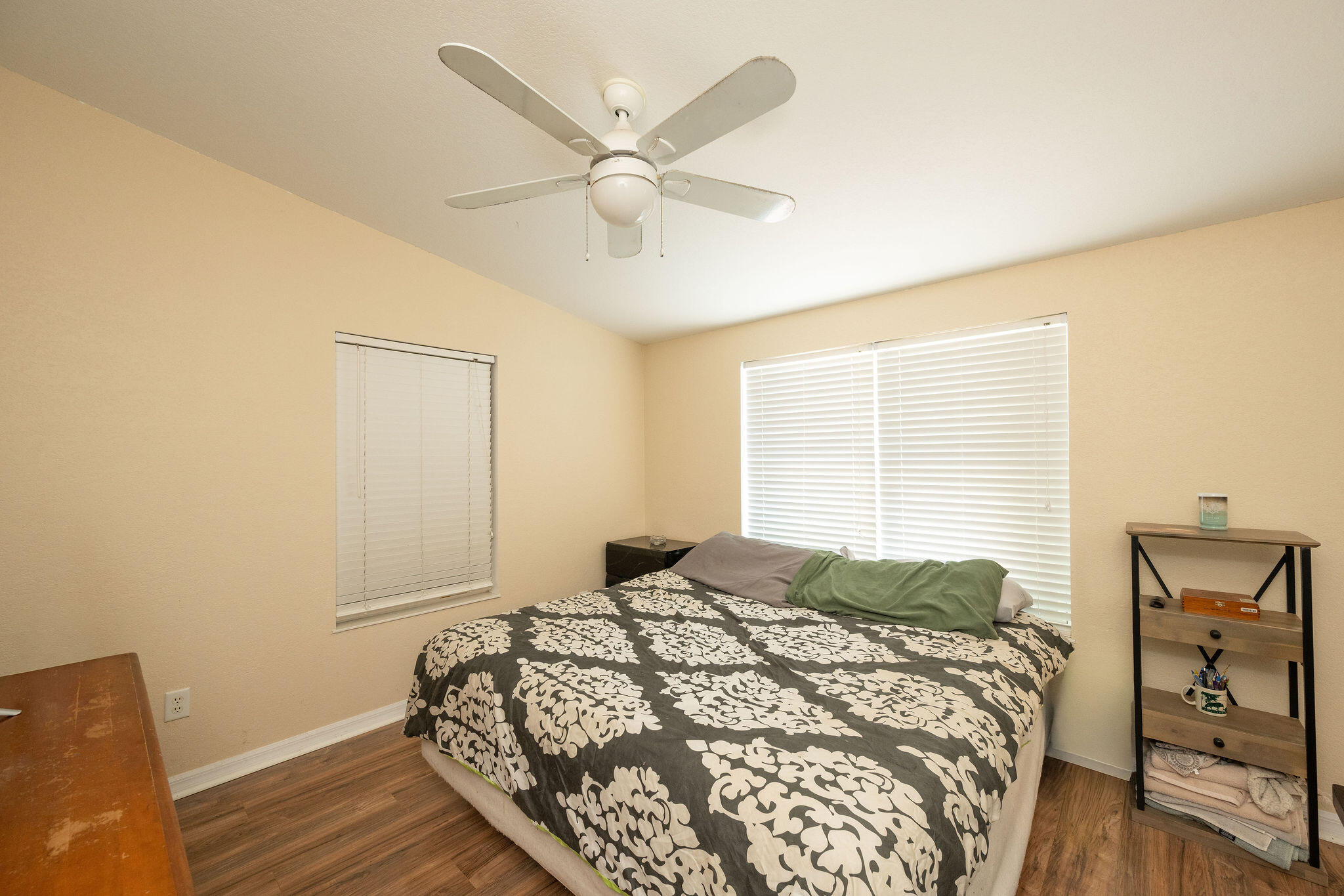 206 4th Street Key West, FL 33040 - Photo 14 of 44 a bedroom with a bed and a table