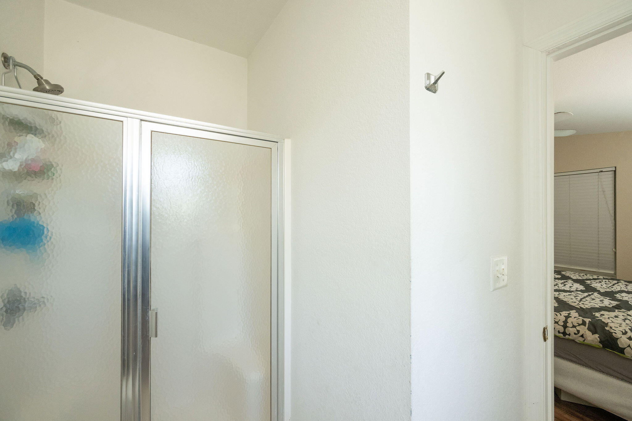 206 4th Street Key West, FL 33040 - Photo 15 of 44 a bathroom with a glass shower door