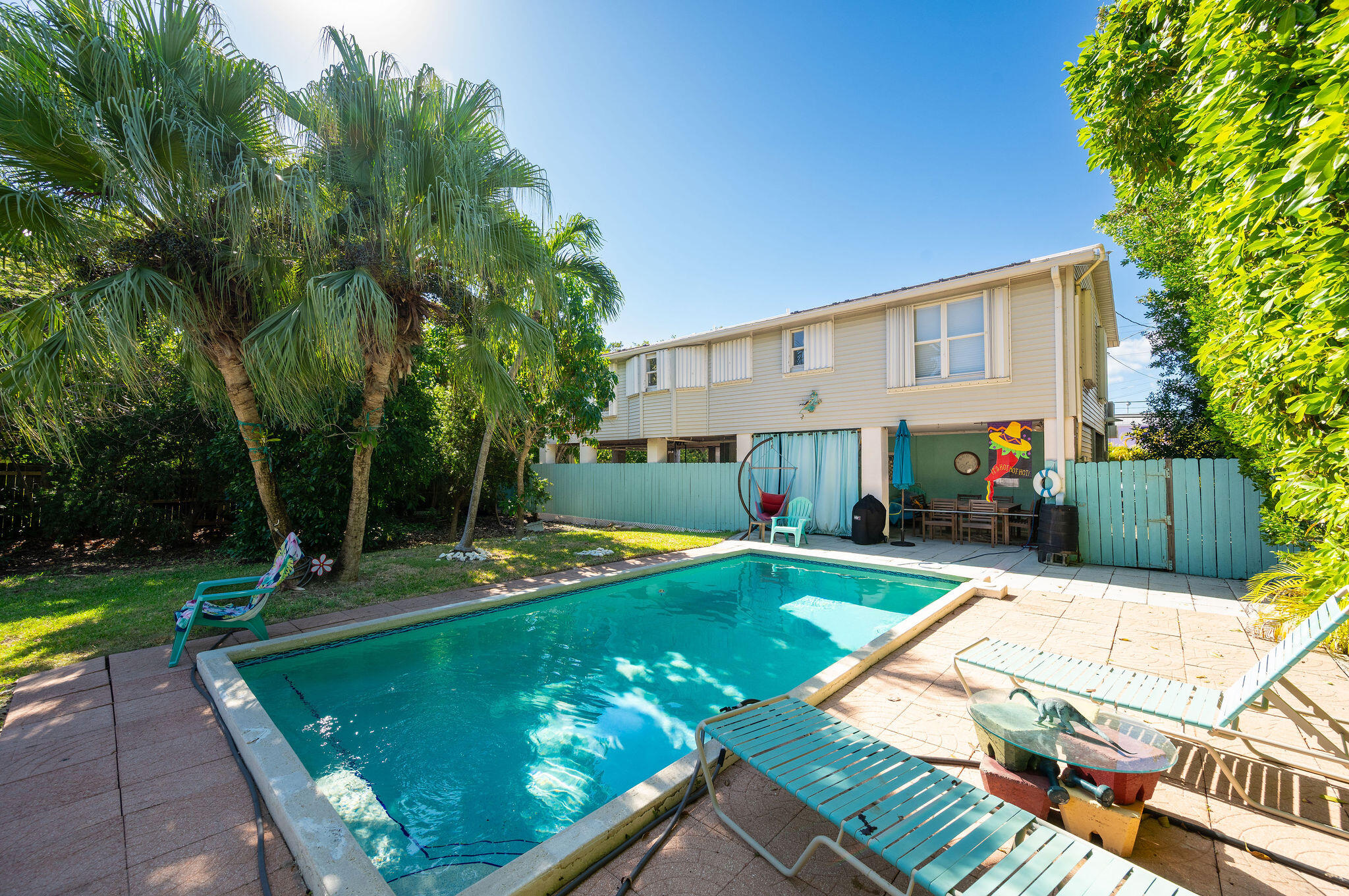 206 4th Street Key West, FL 33040 - Photo 19 of 44 a view of a house with swimming pool and sitting area
