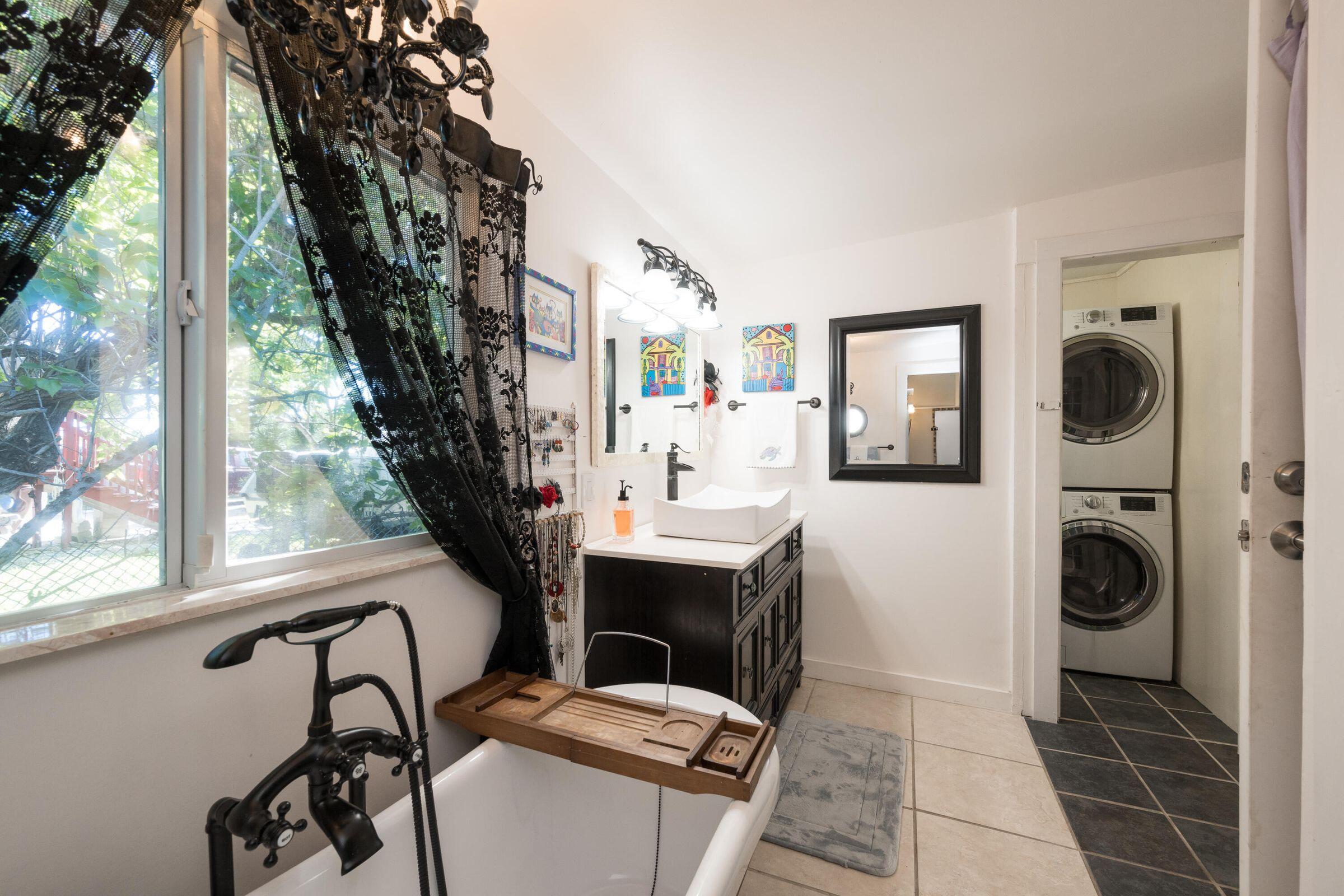 206 4th Street Key West, FL 33040 - Photo 29 of 44 a room with a washing machine and sink