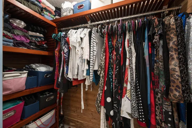 a bathroom with a shower and a mirror