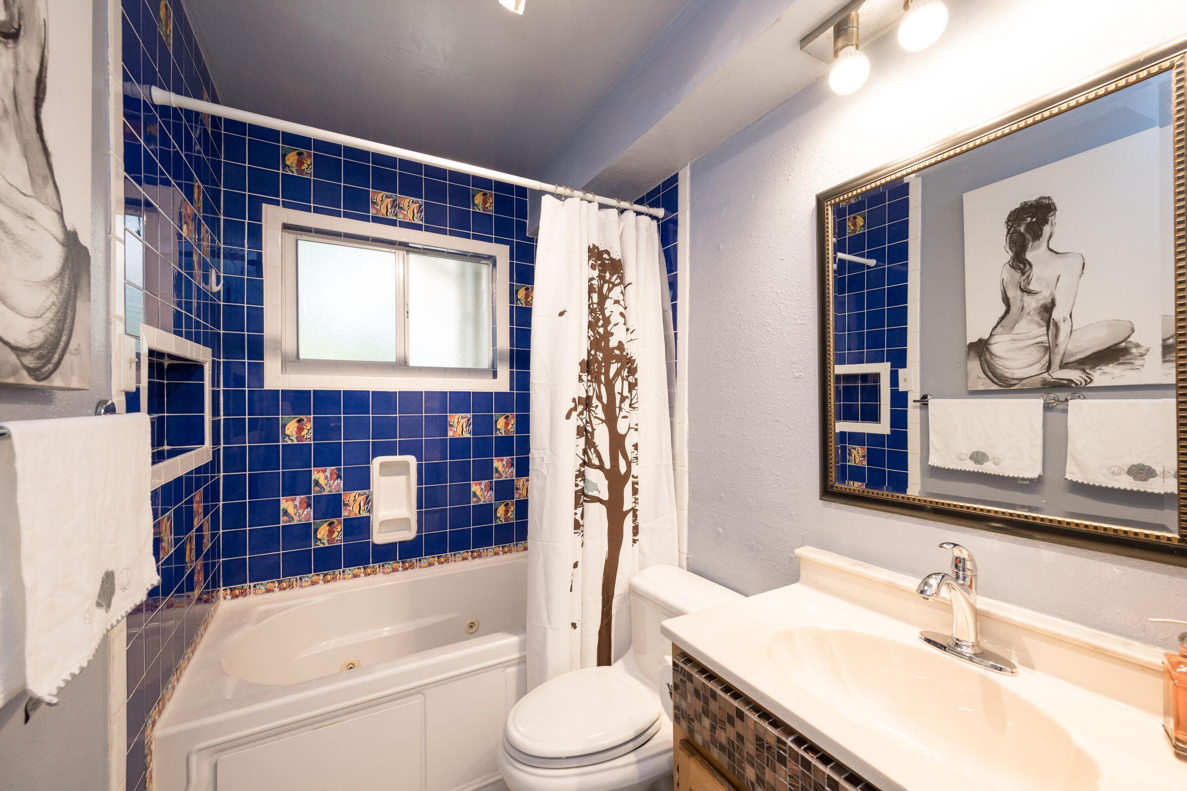 206 4th Street Key West, FL 33040 - Photo 40 of 44 a bathroom with a sink toilet and shower