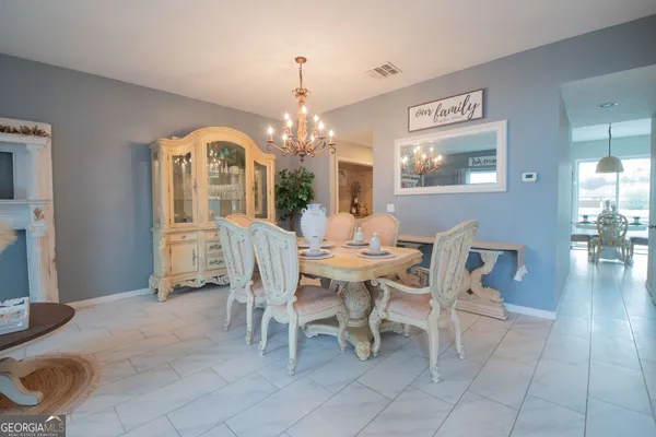 a view of a dining room with furniture