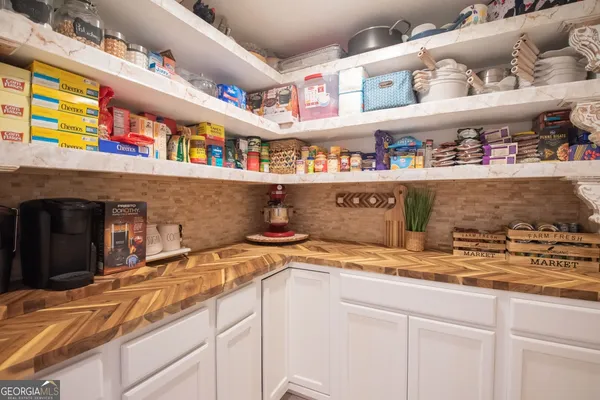 a view of storage and utility room