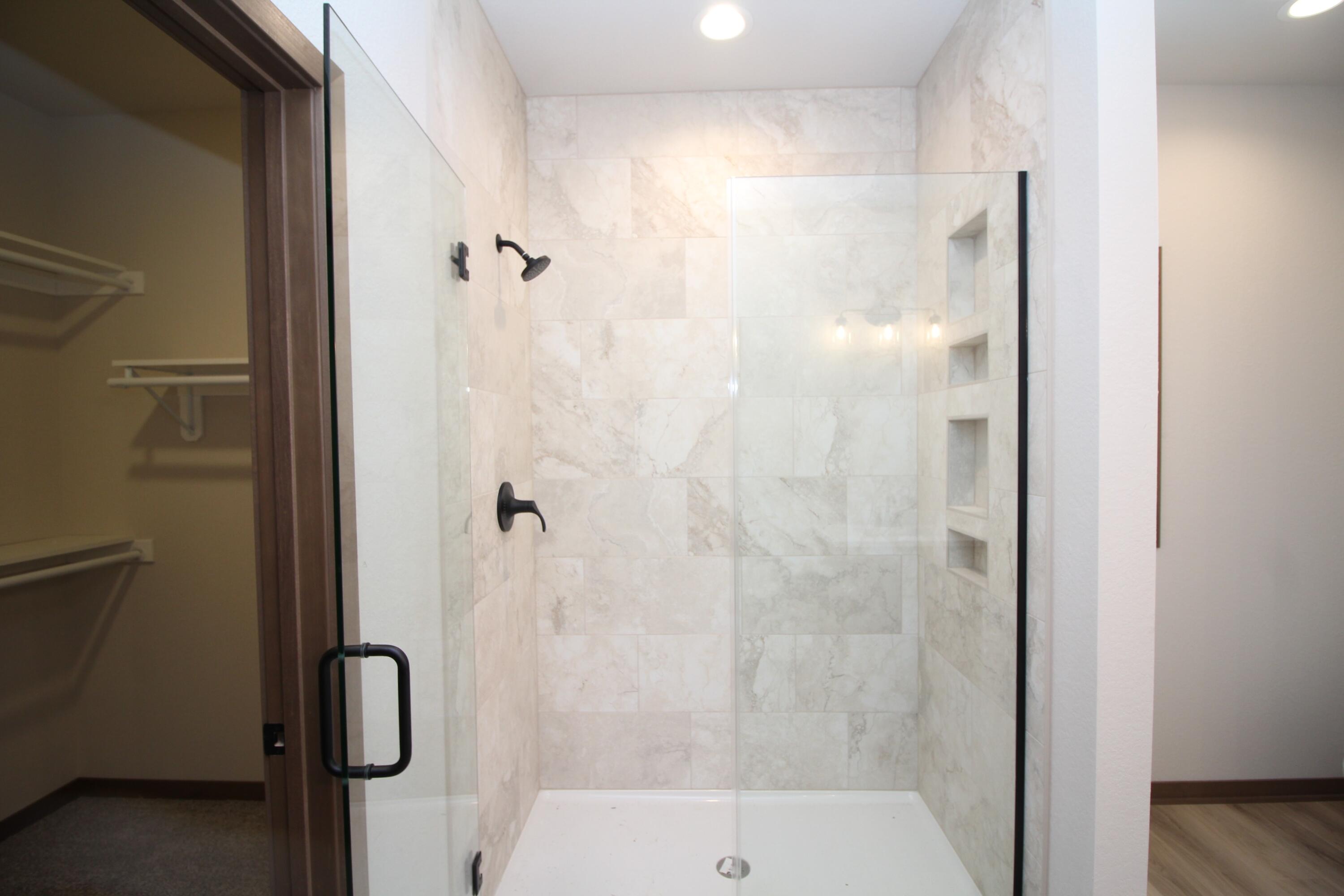 522 Calvin Lane Mount Pleasant, WI 53406 - Photo 11 of 23 Master bath with ceramic tile shower