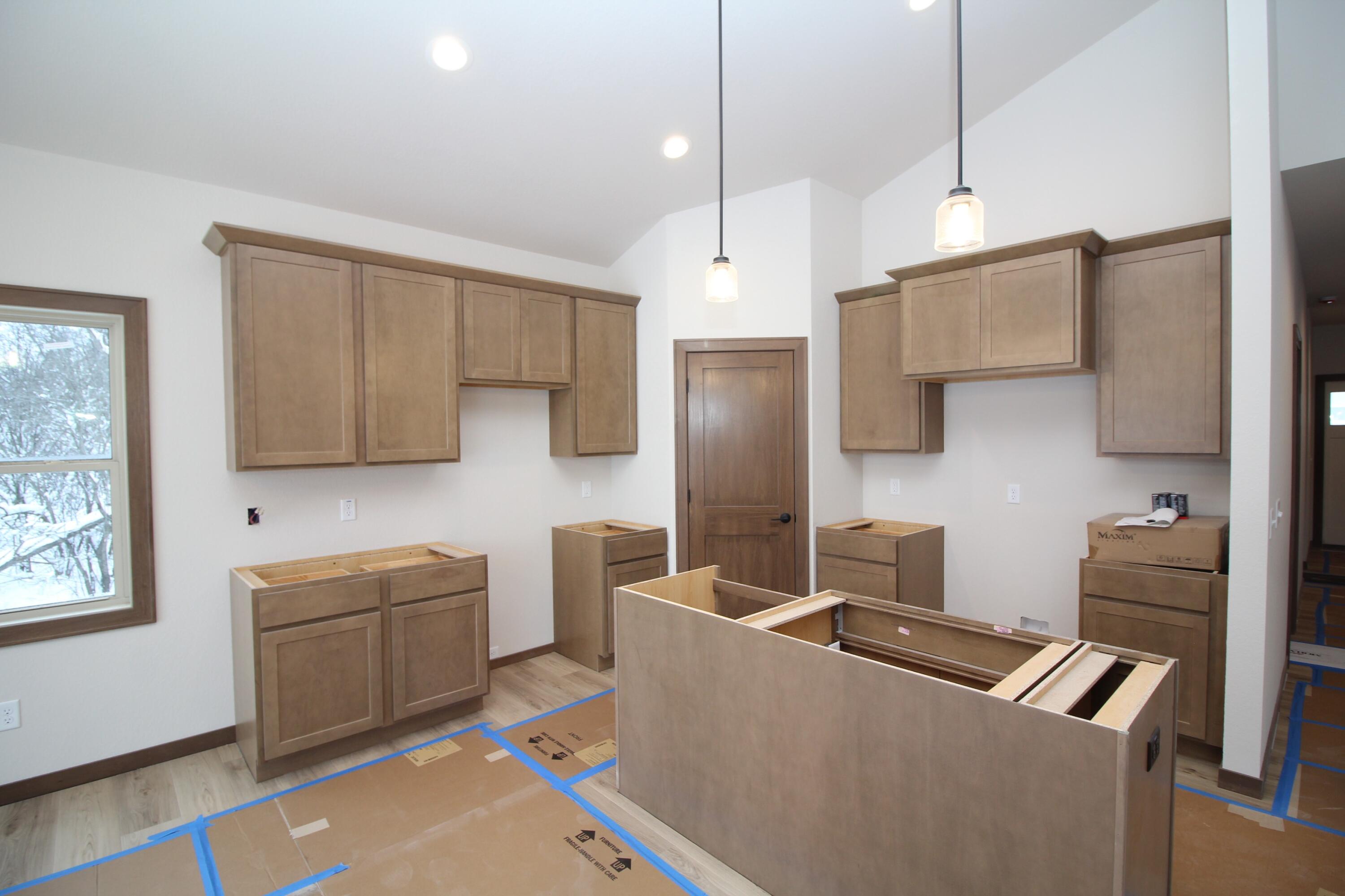 522 Calvin Lane Mount Pleasant, WI 53406 - Photo 3 of 10 New construction in progress: Maple cabinets & quartz countertops