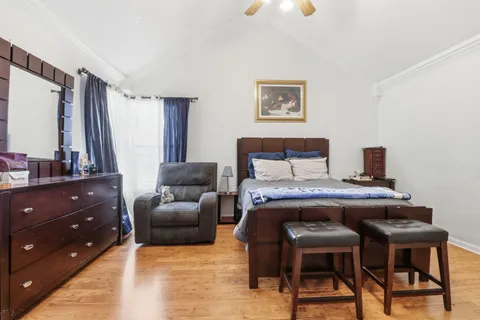 a living room with a couch and a flat screen tv