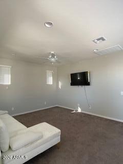 4350 East Jesse Street Gilbert, AZ 85295 - Photo 17 of 19 a living room with furniture and a flat screen tv