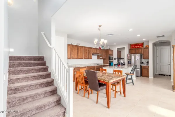 a view of a dining room with furniture