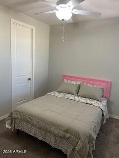 4350 East Jesse Street Gilbert, AZ 85295 - Photo 10 of 19 a bedroom with a bed and chandelier