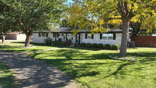 a view of a yard in front of house