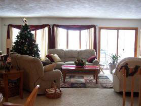 2791 Shopiere Road Beloit, WI 53511 - Photo 3 of 6 a living room with furniture and a potted plant