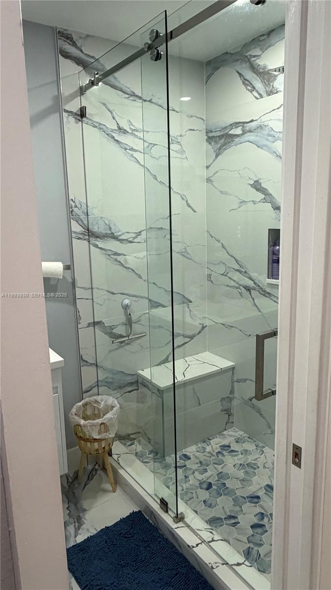 10550 Southwest 51st Street Cooper City, FL 33328 - Photo 23 of 37 a bathroom with a shower