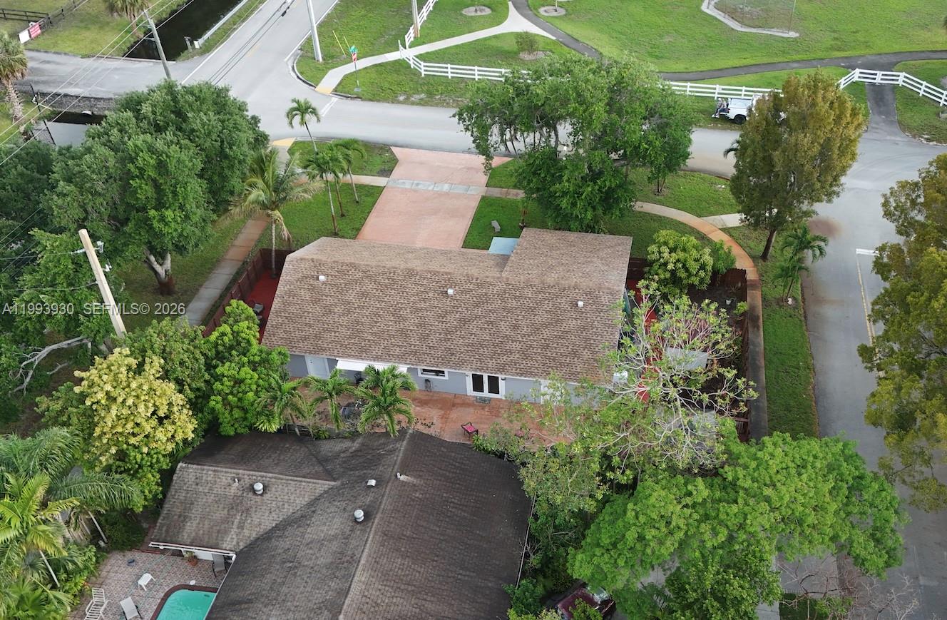 10550 Southwest 51st Street Cooper City, FL 33328 - Photo 6 of 37 an aerial view of a house with a yard