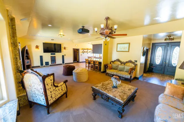 a bed room with a bed and a chair